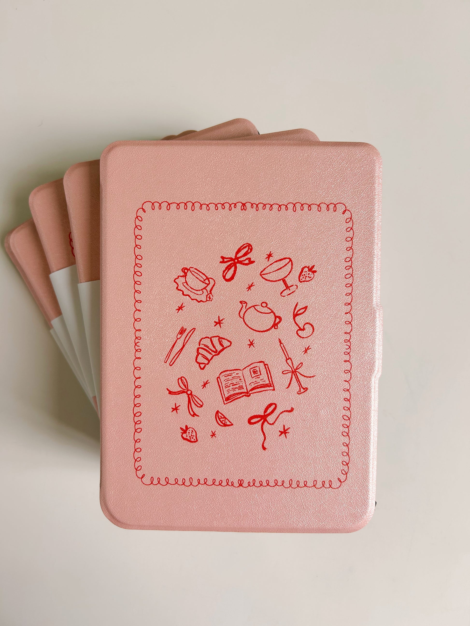 Pink Kindle & Kobo case with red hand-drawn details
